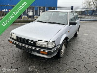 Zilver Occasion 1988 Mazda 323 Hatchback | € 5.950