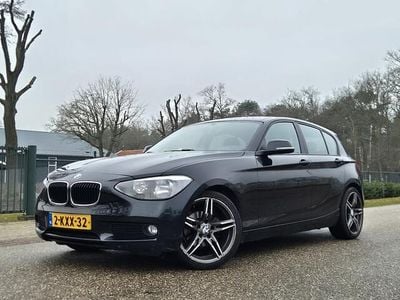 Zwart Occasion 2013 BMW 114 Sport Line Hatchback | € 4.799 (Goede deal)