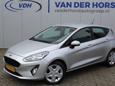 tweedehands Ford Fiesta 1.1-71pk Trend. Mooie wagen voor nog jaren rijplezier ! Airco, Isofix, metallic lak, parkeersensoren achter, cruise cntrl, bluetooth etc.