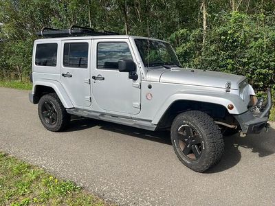 Grijs (metallic) Occasion 2012 Jeep Wrangler Unlimited Sahara SUV | € 17.350