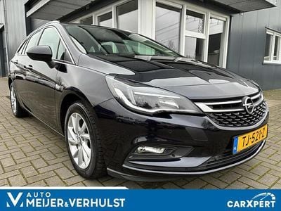 Blauw (metallic) Occasion 2018 Opel Astra Innovation Stationwagen | € 9.999 (Goede deal)
