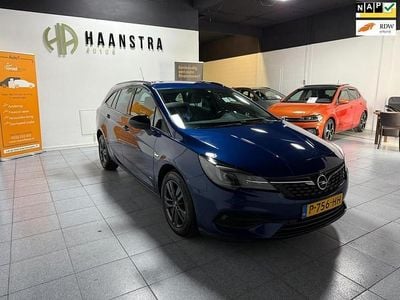Blauw (metallic) Gebruikt 2022 Opel Astra Design & Tech Stationwagen | € 12.500 (Super prijs)