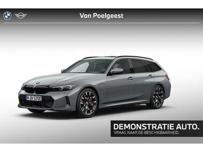 Skyscraper grey metallic (grijs metallic) Occasion 2025 BMW 330e M Sport Stationwagen | € 78.999
