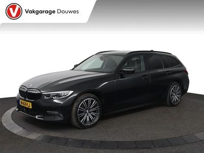 Zwart Occasion 2021 BMW 320e Executive Stationwagen | € 29.450 (Eerlijke prijs)