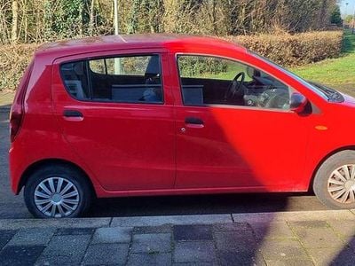 Occasion Daihatsu Cuore 69 PK (50 kW) 2008 Rood Hatchback