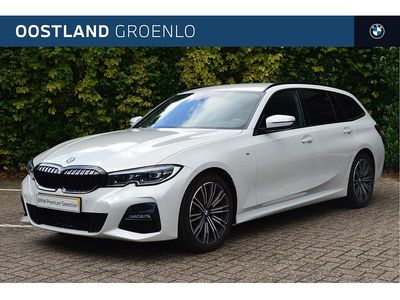Wit Occasion 2021 BMW 320 Executive Stationwagen | € 35.900 (Eerlijke prijs)