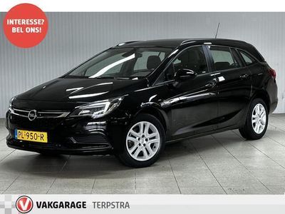 tweedehands Opel Astra Sports Tourer 1.0 Online Edition/ LED Dagrijverl./ DAB+/ Apple+Android/ Airco/ Cruise/ Bluetooth/ Isofix/ USB/ Armsteun/ Dakrails/ Regensensor/ PDC V+A.