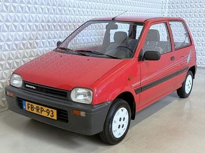 Occasion Daihatsu Cuore 41 PK (30 kW) 1992 Rood Hatchback