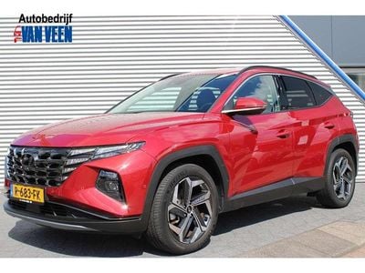 Ultimate red (rood metallic) Gebruikt 2022 Hyundai Tucson Premium SUV | € 32.945 (Eerlijke prijs)