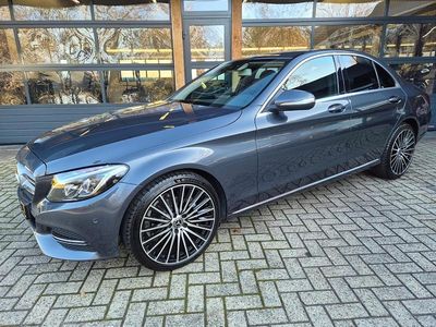 Grijs (metallic) Occasion 2014 Mercedes C180 Prestige Sedan | € 18.500
