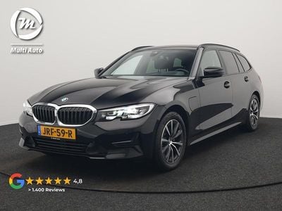 Zwart Occasion 2021 BMW 320e Advantage Stationwagen | € 25.240 (Eerlijke prijs)