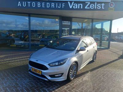 tweedehands Ford Focus Wagon 1.5 ST-Line, Airco(automatisch), Multimedia systeem, Bluetooth telefoonverbinding, Navigatie, Stoelverwarming, Verwarmd stuurwiel, Parkeerhulp, Camera, Parkeersensoren, Dimlicht automatisch, Keyless start ,Nette auto, Dealer onderhouden,