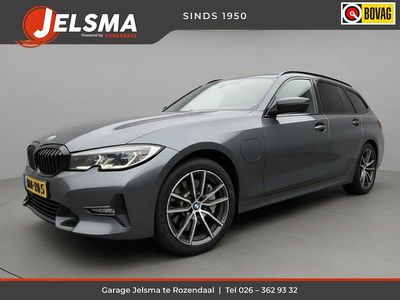 Grijs Occasion 2025 BMW 330e Executive Stationwagen | € 30.000