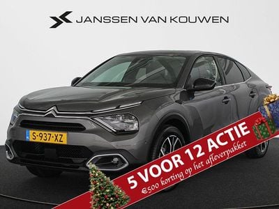 Grijs Gebruikt 2023 Citroën e-C4 Shine Sedan | € 21.745 (Eerlijke prijs)