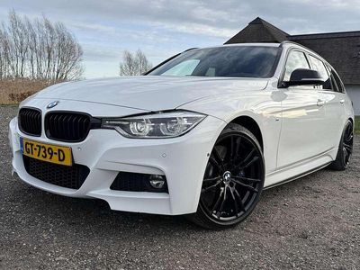 Wit Occasion 2015 BMW 330 M Sport Stationwagen | € 16.500