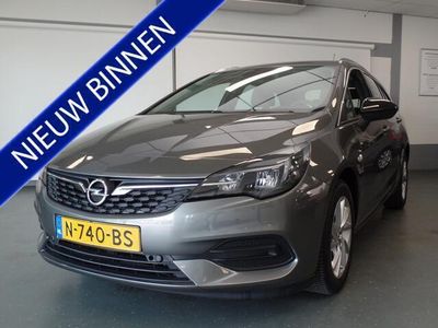 tweedehands Opel Astra Sports Tourer 1.2 Business Elegance Clima contole, cruise controle, Navigatie Pdc V/A, Lm velgen, Deels leder, Xenon, Achteruitrijcamera, full options Bovag afleverpakket 695,-