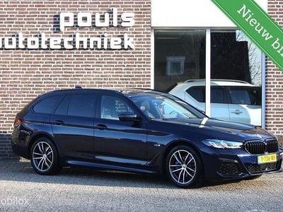 Blauw Occasion 2024 BMW 530e M Sport Stationwagen | € 43.750 (Goede deal)