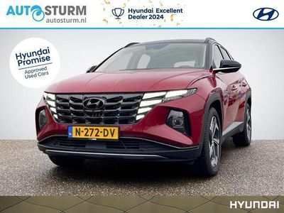 tweedehands Hyundai Tucson 1.6 T-GDI HEV Premium | Trekhaak | Navigatie | Vol-Leder | Apple Carplay/Android Auto | Dodehoek | Geheugenstoel | Stuur- + Stoelverwarming | 360° Camera | Rijklaarprijs!