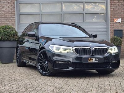 Zwart Occasion 2019 BMW 520 Executive Stationwagen | € 26.800 (Eerlijke prijs)