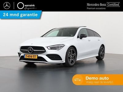 tweedehands Mercedes CLA200 Shooting Brake AMG NIGHT Premium Plus | Adaptieve Cruise Control | Panoramadak | Sfeerverlichting | Stoelverwarming | 360-camera | Head-Up Display | Elektrische Kofferklep |