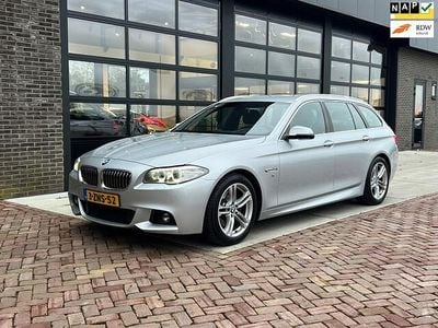 Grijs Occasion 2015 BMW 520 Executive Stationwagen | € 16.975 (Iets duurder)