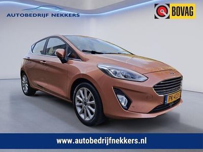 Oranje (metallic) Occasion 2017 Ford Fiesta Titanium Hatchback | € 9.950 (Eerlijke prijs)