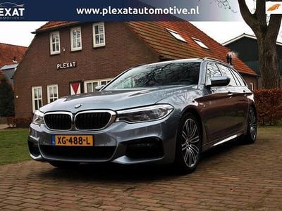 Grijs Occasion 2019 BMW 520 Executive Stationwagen | € 25.945 (Eerlijke prijs)