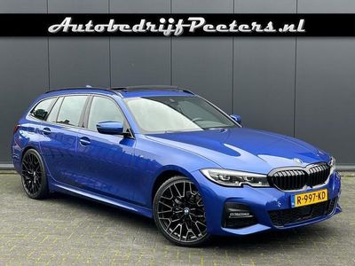 Blauw (metallic) Occasion 2021 BMW 320 M Sport Stationwagen | € 34.950 (Iets duurder)