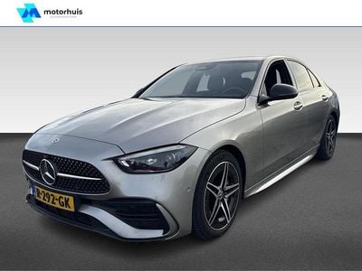 Grijs (metallic) Gebruikt 2022 Mercedes C200 AMG line Sedan | € 35.995 (Goede deal)