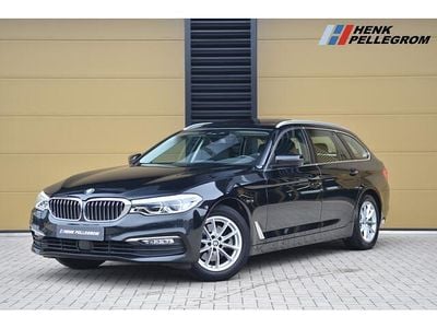Zwart (metallic) Occasion 2018 BMW 520 Executive Stationwagen | € 20.950 (Goede deal)