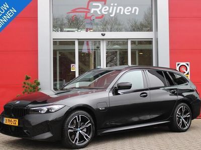 tweedehands BMW 320e 3-SERIE Touring204PK AUTOMAAT HYBRID M-SPORT | CURVED DISPLAY | ELEKTRISCH WEGKLAPBARE TREKHAAK | PANORAMISCH SCHUIF/KANTEL DAK | APPLE CARPLAY | ELEKTRISCHE ACHTERKLEP | STOEL VERWARMING | NAVIGATIE | ADAPTIVE CRUISE CONTROL | DAB+ RADIO | 18"