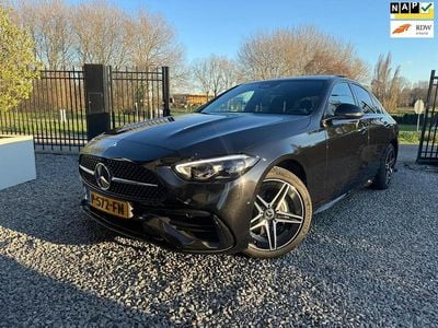 Zwart Gebruikt 2022 Mercedes C300e AMG line Sedan | € 38.750 (Eerlijke prijs)