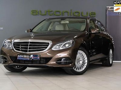 Bruin, metallic lak Occasion 2013 Mercedes E200 Sedan | € 24.995