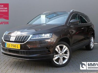 tweedehands Skoda Karoq BWJ 2018 1.0 TSI Style Business AUTOMAAT KEYLESS / STOELVERW. / SCHUIF.KANTELDAK / PANODAK / A.U.R.CAMERA / V+A PDC / APPLE.CARPLAY / ANDROID.AUTO / DAB+ / NAVI / CLIMA / CRUISE / LMV / ELEK.PAKKET / ARMSTEUN / ISOFIX