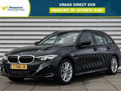 Occasion BMW 320e Basis 163 PK (119 kW) 2023 Zwart Stationwagen