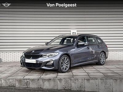 Grijs Gebruikt 2022 BMW 318 Executive Stationwagen | € 33.900 (Eerlijke prijs)