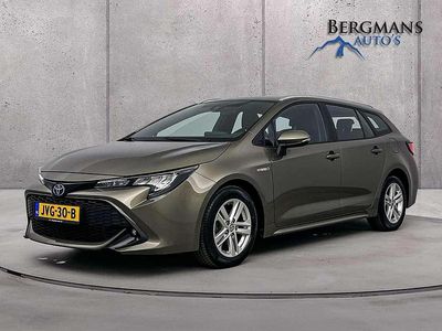 Bruin (metallic) Occasion 2021 Toyota Corolla Comfort Stationwagen | € 20.800 (Eerlijke prijs)