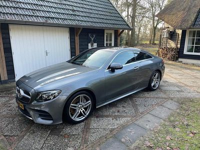Grijs (metallic) Occasion 2019 Mercedes E350 AMG line Coupé | € 39.900