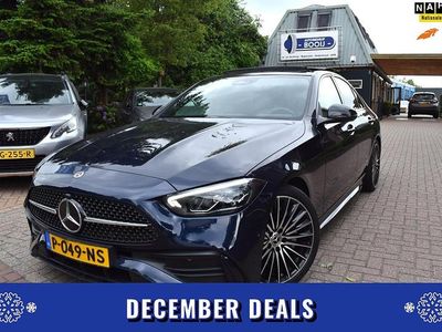 Blauw (metallic) Occasion 2022 Mercedes C200 AMG line Sedan | € 43.945 (Eerlijke prijs)