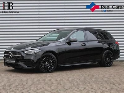 Zwart Occasion 2022 Mercedes C300e AMG line Stationwagen | € 37.440 (Eerlijke prijs)