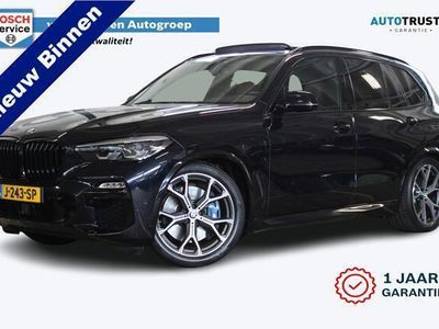 tweedehands BMW X5 xDrive45e Executive | Incl. 12 maanden Garantie | M-Sport pakket | LED koplampen | Apple CarPlay | Panoramadak | Elektrische Trekhaak | Luchtvering | Adaptive Cruise | Zwarte sierlijsten | Lederen memory zetels | Harman Kardon audio |