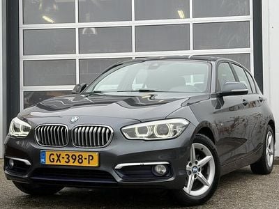 Grijs Occasion 2015 BMW 118 Comfort Edition Hatchback | € 9.950 (Eerlijke prijs)