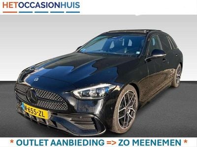 Zwart (metallic) Occasion 2022 Mercedes C200 AMG Stationwagen | € 33.445 (Eerlijke prijs)