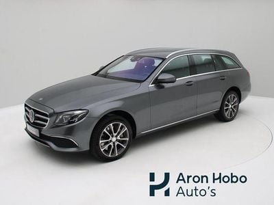 Grijs (metallic) Occasion 2019 Mercedes E450 Premium Stationwagen | € 39.950