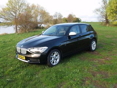 Zwart Gebruikt 2012 BMW 116 Hatchback | € 9.500 (Eerlijke prijs)