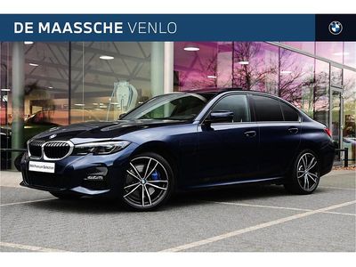 Blauw Occasion 2021 BMW 320e Executive Sedan | € 35.450