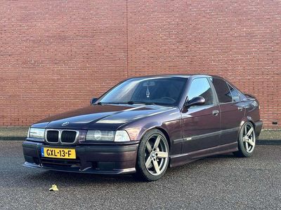 Paars Occasion 1992 BMW 320 Sedan | € 10.999