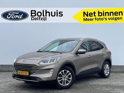 Bruin (metallic) Occasion 2020 Ford Kuga Titanium X SUV | € 20.950 (Goede deal)