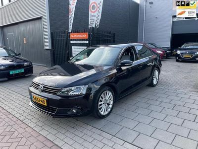Zwart, metallic lak Occasion 2013 VW Jetta Highline Sedan | € 8.999 (Iets duurder)