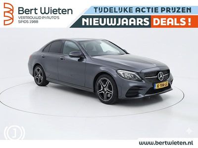 Grijs Occasion 2021 Mercedes C300e AMG Sedan | € 30.745 (Eerlijke prijs)